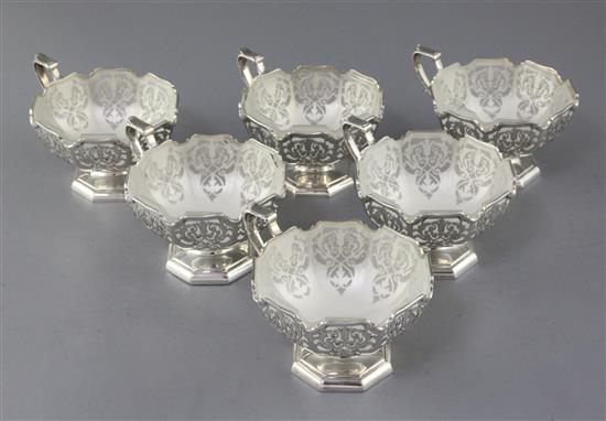 A set of six 1930s pierced silver single handled sundae dishes by Mappin & Webb, 31 oz.